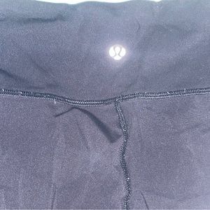 Used black cropped Lululemon pants size 10